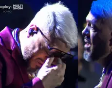 Belo não consegue conter as lágrimas e chora durante show após separação